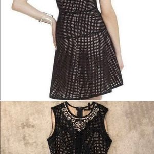 BCBG beautiful black dress with embellished neckline and fitted bodice